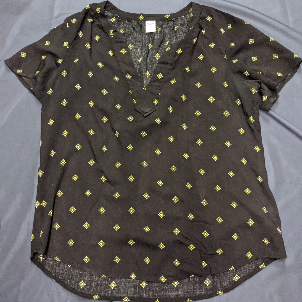 Super cute Black and Gold v-neck shirt.